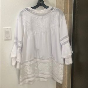 White cotton shirt with flounced sleeves